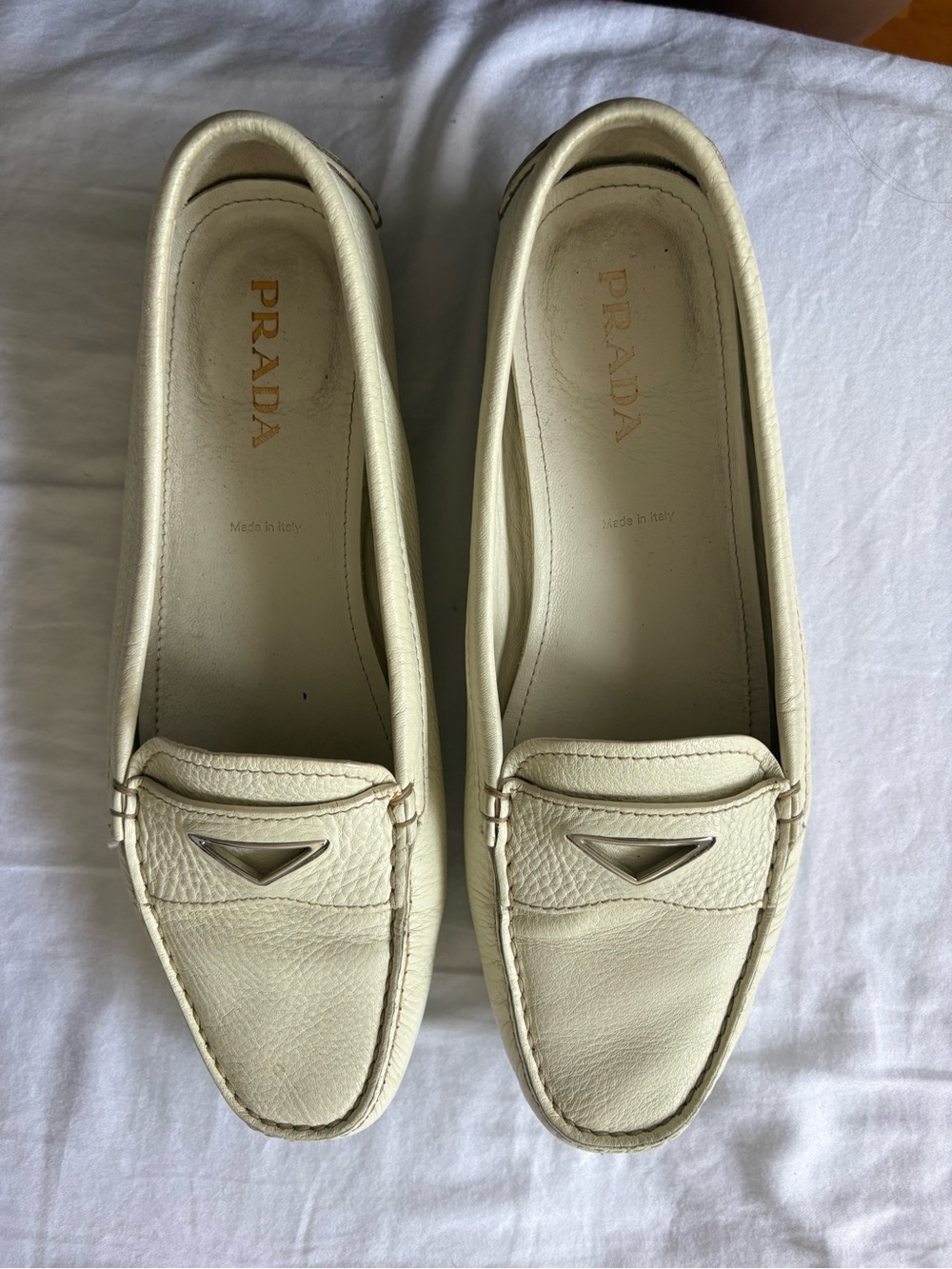 Prada Cream Leather Loafers with Silver Triangle Logo